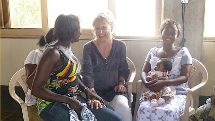 Sonja Dinner attending together with young mothers school lessons in inventory management in a church in Ghana. School lessons are mandatory for all recipients of microcredit loans.