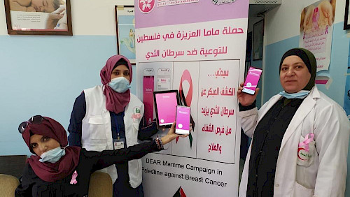 Nurses of the Beita Women's Development Society presenting the DearMamma Breast Cancer Awareness Campaign.